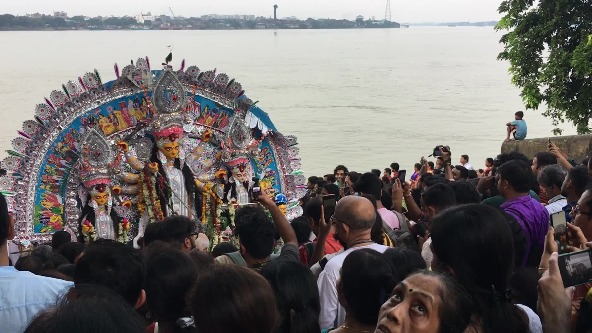 Hindu devotees gathered to see Durga idol immersion in Ganges