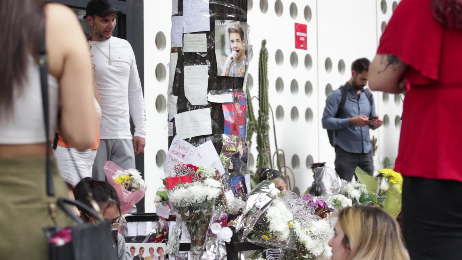 Fans continue to gather outside hotel where Liam Payne died in Buenos Aires