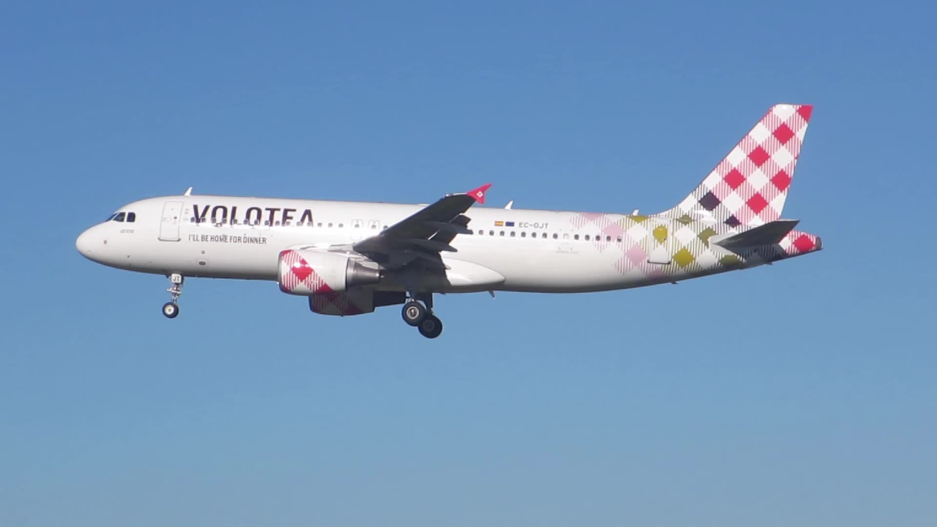 Volotea Airbus landing, while Shenzhen Airlines Airbus A330 starts takeoff at Barcelona airport