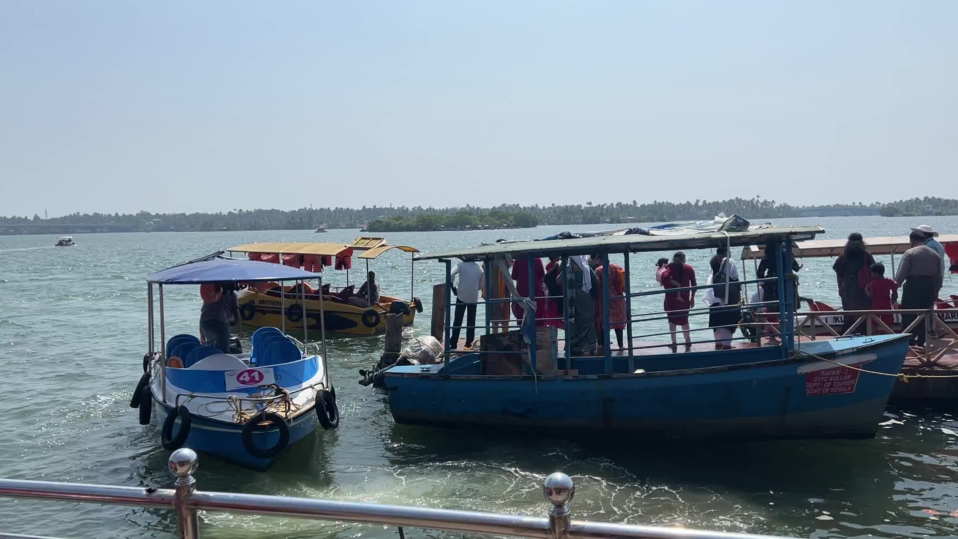 Indian tourists board boats to travel to Sambranikodi Island 