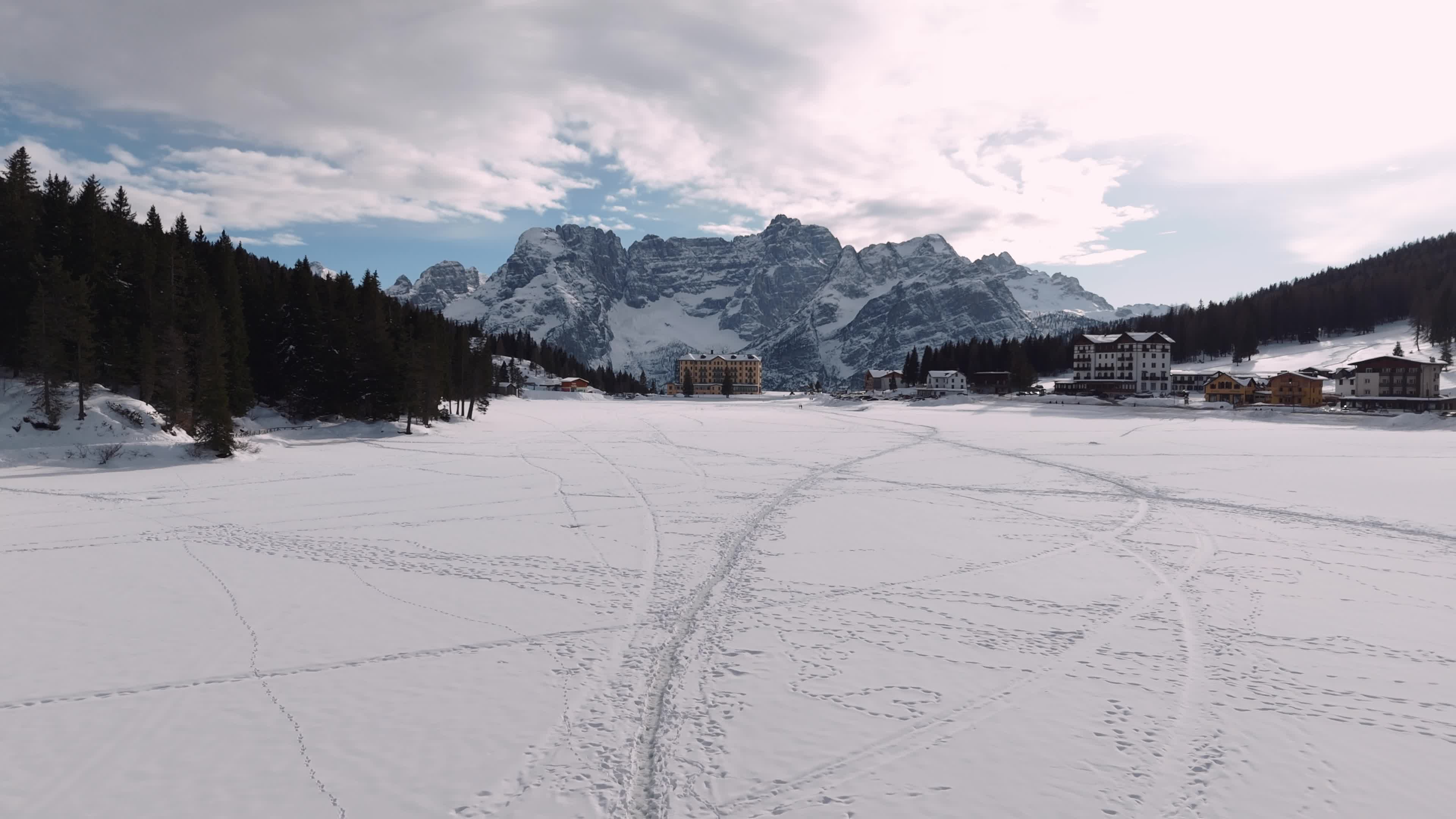 Drone View of Frozen Lake Misurina Covered in Snow